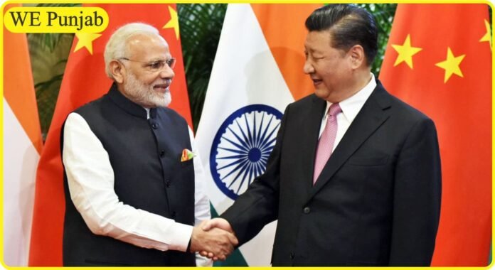 India's PM Modi and China's President Xi Shaking hand.