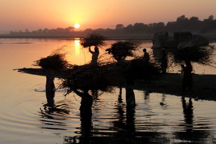 Cloudy skies and glowing sunset over River Ravi in Lahore-Photo by Asif Jutt