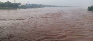 Floodwater flowing through Ravi River near Shahdara, Lahore. WE Punjab Photo