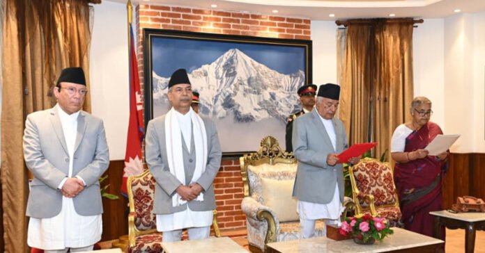 Nepal’s interim Prime Minister Sushila Karki (far right) taking oath of office in Kathmandu.