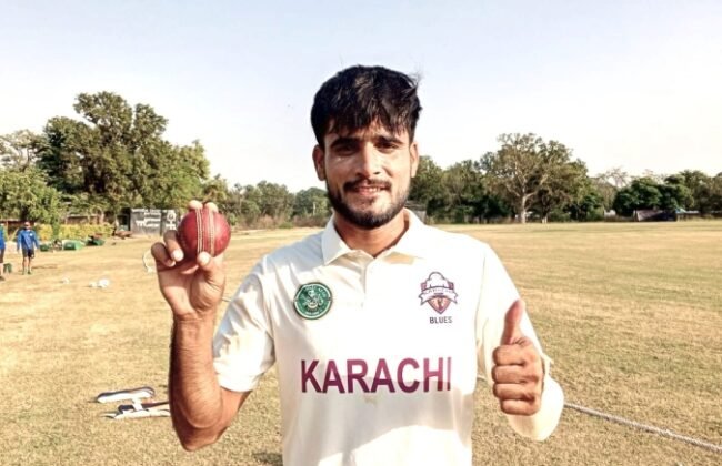 The image shows Karachi's Saqib poses with the ball after taking six wickets-PCB