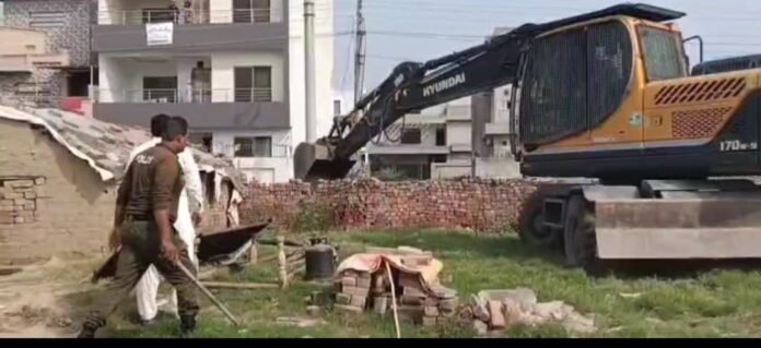 The picture shows LDA demolishing illegal constructions in LDA Avenue-I Housing Scheme-WE Punjab