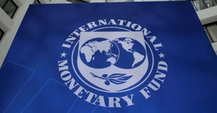 Signboard in front of the IMF building reading ‘International Monetary Fund.’
