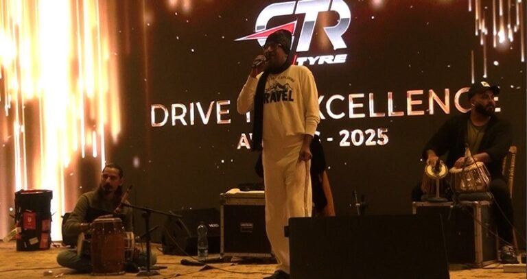The image shows artist performing at Drive to Excellence Awards 2025-GTR