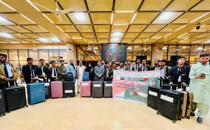 The picture shows students at airport prior to their departure for China
