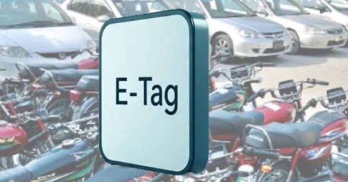 Image reads E-Tag board with motorcycles in background.
