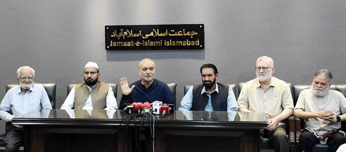 Jamaat-e-Islami Emir Hafiz Naeem ur Rehman addresses a press conference in Islamabad.