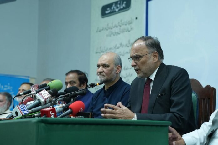 Federal Minister Ahsan Iqbal addresses press conference alongside JI Emir Hafiz Naeem ur Rehman at Mansoorah Lahore.